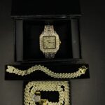 Men’s gold watch and matching chain set