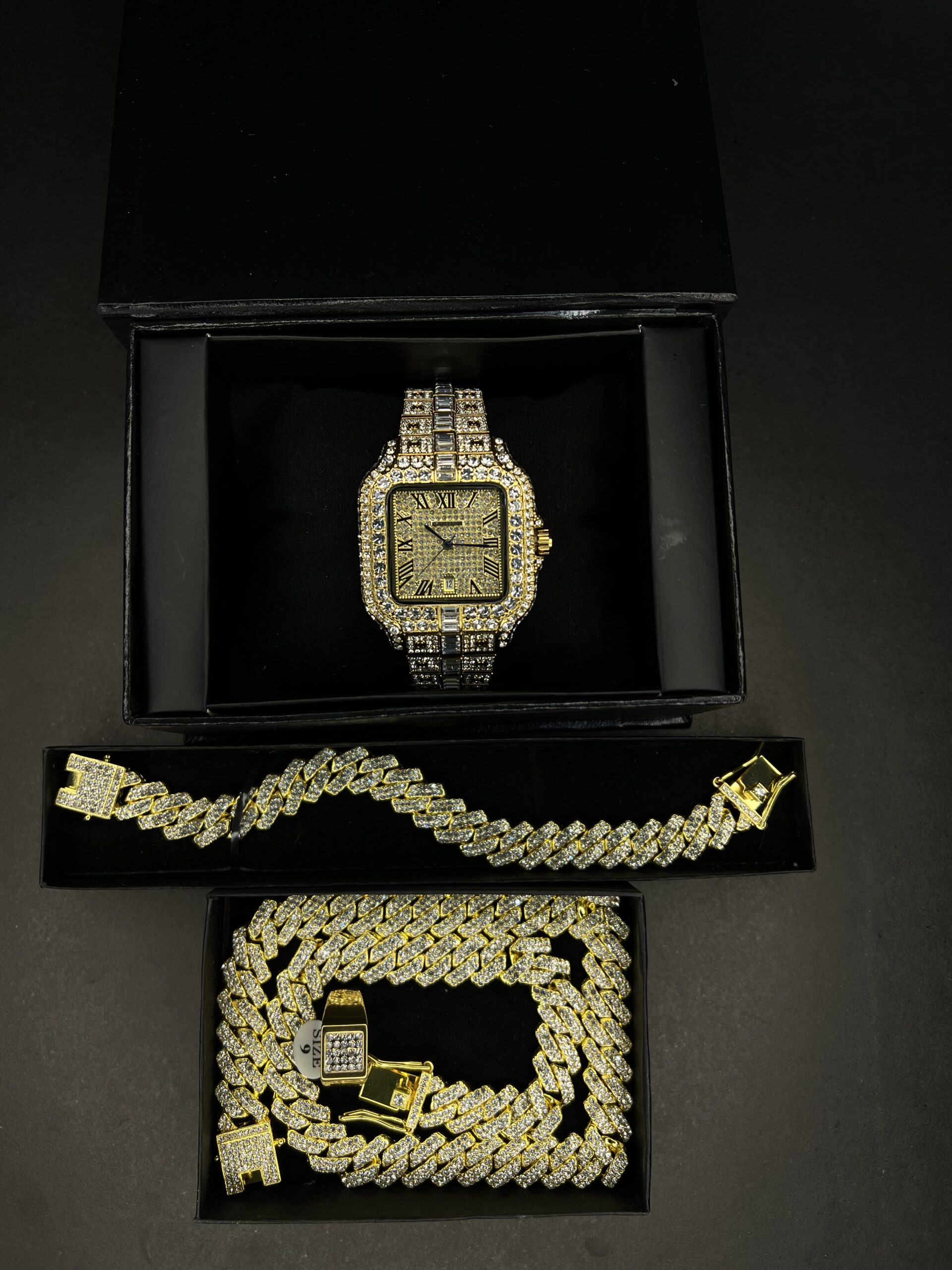 Men’s gold watch and matching chain set